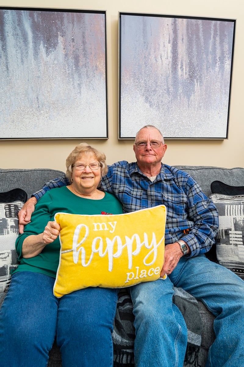 Couple at Otterbein St. Marys with My Happy Place pillow