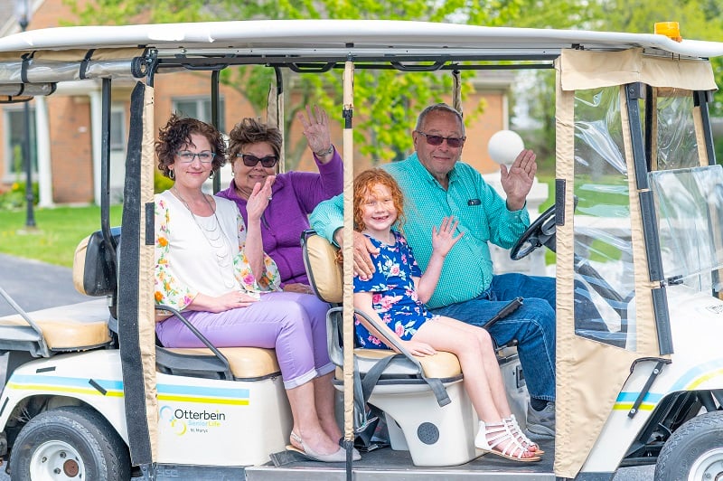 Family on golf cart at St. Marys